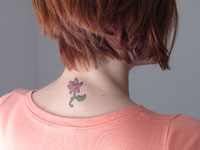 Small flower tattoo